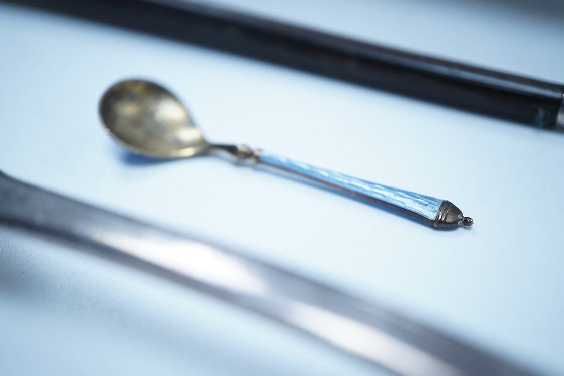 A small group of silver to include an Elizabeth II pierced shallow dish by Viners Ltd, Sheffield, 1957, diameter 12.4cm, a 1930's silver mounted cigarette box, a George III silver fiddle pattern sauce ladle and five silv